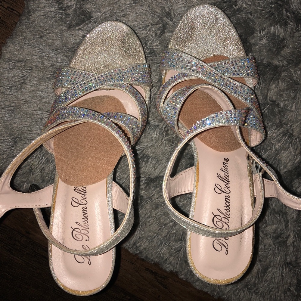 Silver iridescent heels- they have feet prints